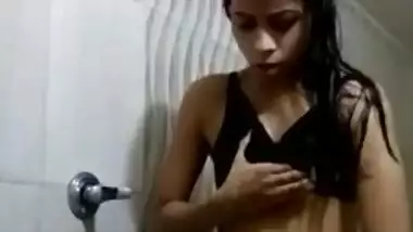 Girl becomes excited and masturbates her Desi pussy in the shower room