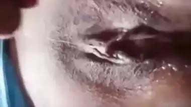 Desi exposes naked pussy without any sense of shame and touches it