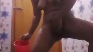 Bhabhi in bathroom baths and fingers cunt in horny mood