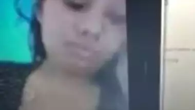 During video chat Desi gal reluctantly flashes BF her medium XXX tits